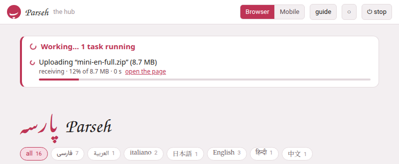 The hub while a bundle is uploaded from another tab: the panel above the name, the upload's progress, and the way back to the page that started it